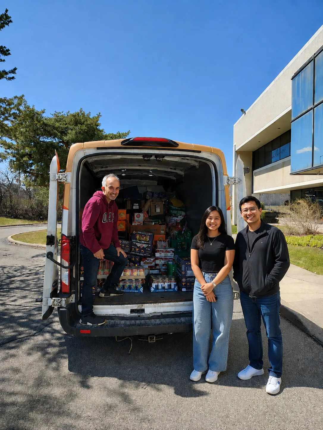 Amin Nanji with volunteers at a community food drive in Ward 11